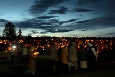 Luci, fiaccolata corteo