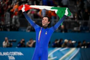 Davide Ghiotto esulta alle Olimpiadi Milano-Cortina 2026