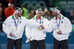 Davide Ghiotto, Andrea Giovannini e Michele Malfatti vincono l'oro a Milano-Cortina 2026
